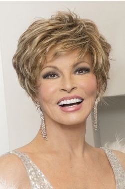 Raquel Welch in a layered blonde pixie wig with textured layers and bangs