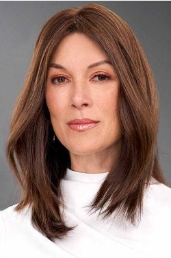 Woman in a 12" straight brown human hair topper for thinning hair