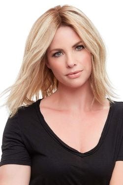 Woman in a straight 12" light blonde human hair topper for thinning hair