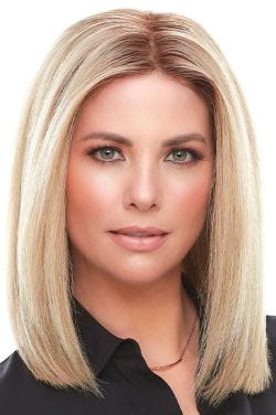 Woman in a 12" light blonde human hair topper for thinning hair