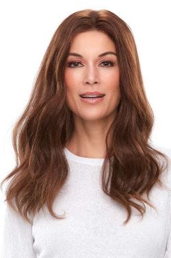 Woman in 18" wavy medium auburn lace front hair topper for thinning hair