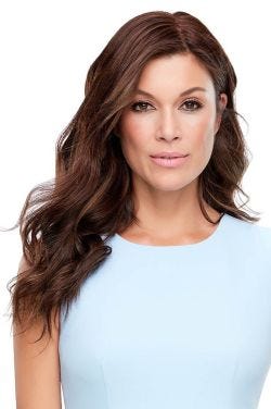 Woman in an 18" dark auburn human hair topper for thinning hair