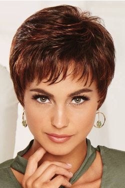 Woman in auburn short pixie wig with short bangs