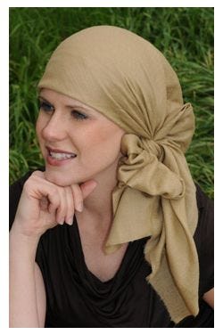 Woman outdoors in beige cashmere head scarf for women