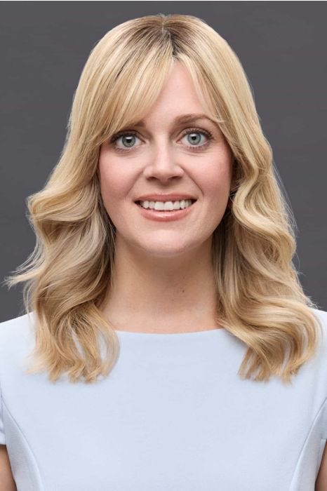 Woman in an extra large 12" blonde human hair topper for thinning hair