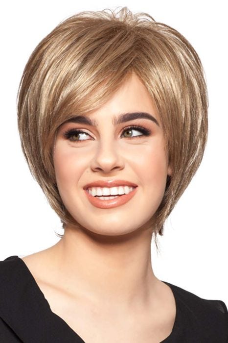 Woman in a close cropped chin length light blonde bob wig