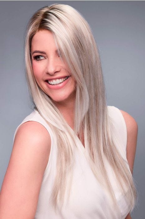 Woman in an extra long ash blonde lace front wig