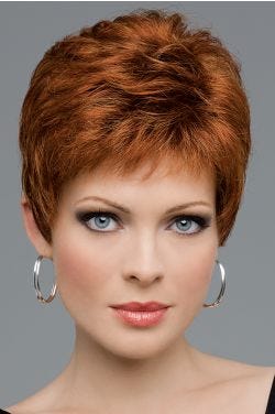 Woman in a classic cropped light red pixie lace front wig with bangs