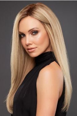 Woman in a petite extra long light blonde straight lace front wig