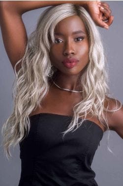Afro American Woman in an extra long silver curly lace front wig