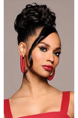 Black woman wearing curly clip on bun hair piece in black