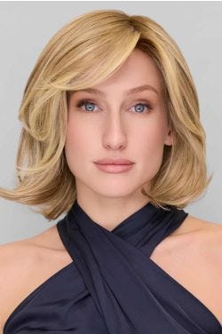 Woman in a short, blonde wavy lace front bob wig with side swept bangs