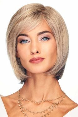 Woman in straight, shoulder length light brown bob lace front wig with bangs