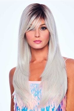 Woman in an extra long straight silver wig with long layers and side bangs