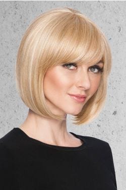 Woman in a 4.5" to 10.5" light blonde hair topper for thinning hair