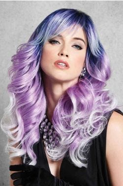 Woman in an extra long purple ombre curly wig with side bangs