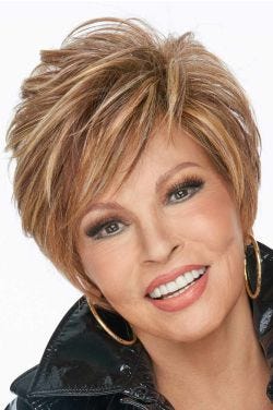 Raquel Welch in an extra long light auburn lace front pixie wig with side bangs