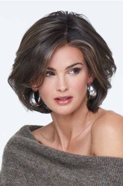 Raquel Welch in a chin length light auburn layered lace front bob wig
