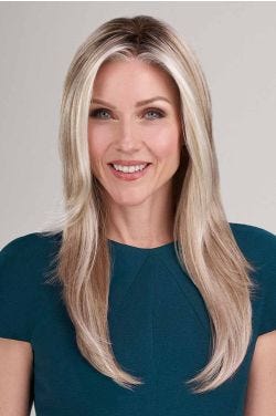 Happy woman in extra long golden blonde lace front wig with highlights and long textured layers