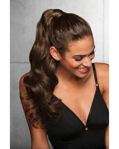 Woman in a 23" dark brown clip on curly ponytail attached to her hair