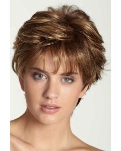 Woman in a medium brown pixie wig with longer hair on the top and sides
