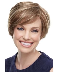 Woman in a long light brown shaggy pixie wig with side bangs