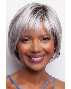 African American woman in a chin length silver bob wig with fringe bangs