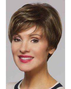Woman in a dark brown classic pixie wig with fringe bangs