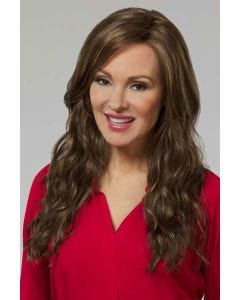 Woman in an extra long medium brown curly lace front wig