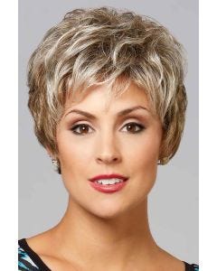 Woman in a long layered light blonde pixie wig with wispy bangs
