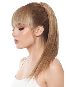 Woman in an 18.5" warm blonde human hair ponytail hair clip