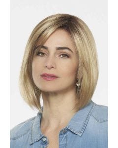 Woman in a shoulder length gold blonde lace front bob wig