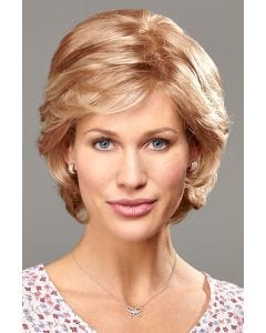 Woman in a long light auburn lace front pixie wig with side bangs