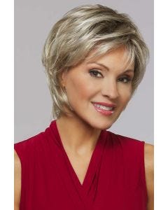 Woman in a close cropped ash blonde short lace front wig with wispy bangs
