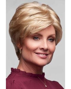 Woman in a long light blonde lace front pixie wig