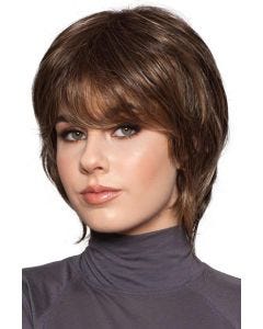 Woman in a shoulder length heavily layered dark brown bob wig with side bangs