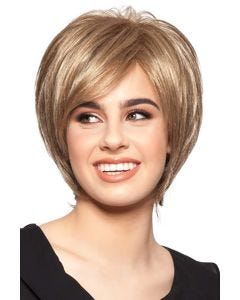Woman in a close cropped chin length light blonde bob wig