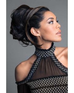 Woman in a wrap around full curly dark brown bun hairpiece attached to her hair