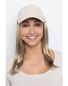 Woman in a solid beige baseball cap with extra long dark brown hair attached