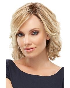 Woman in a short, blonde wavy lace front bob wig with side swept bangs