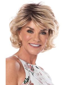 Layered heat-friendly bob wig with feathered bangs, soft waves, and chin-length volume