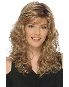 Woman in a past the shoulders curly blonde hair with side bangs