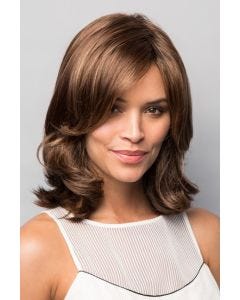 Woman in medium auburn long curly bob wig with shorter layers along the face