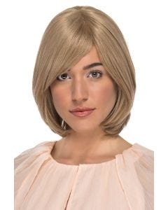 Woman in a shoulder length layered bob wig with long side bangs