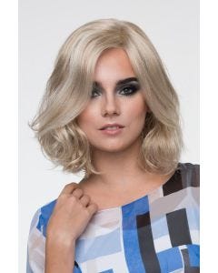Woman in a chin length curly light blonde lace front wig