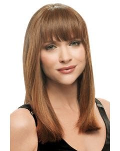 Woman with ginger brown blunt clip in bangs attached to her hair