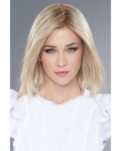 Woman in an 11" to 12" light blonde lace front hair topper for thinning hair