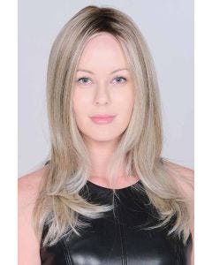 Woman in an extra long ash blonde lace front wig with long layers