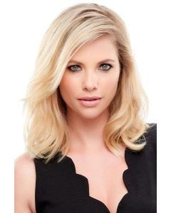 Woman in a 12" light blonde human hair topper for thinning hair