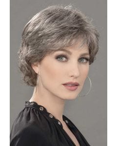 Woman in a 4" to 5" grey hair topper for thinning hair